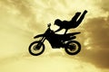 Freestyle motocross at sunset