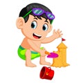 Funny boy making a big sandcastle at beach Royalty Free Stock Photo