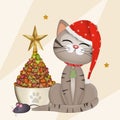 kitten with croquettes Christmas tree Royalty Free Stock Photo