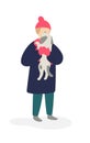 Illustration of a girl playing with a dog. Vector. Girl teenager in a coat and hat holding a dog. Flat cartoon style. Pet for a Royalty Free Stock Photo
