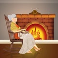 Grandmother sitting on the rocking chair in front of the fire