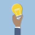 Illustration of hand holding bulb Royalty Free Stock Photo