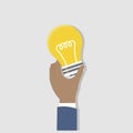 Illustration of hand holding lightbulb