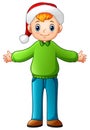 Happy boy cartoon wearing green christmas sweater Royalty Free Stock Photo