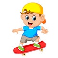 Happy boy playing skateboard Royalty Free Stock Photo