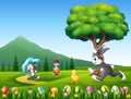 Happy bunnies running on the nature background