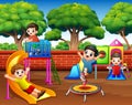 Happy children playing in the playground at daytime Royalty Free Stock Photo