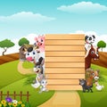 Happy farm animals with blank sign bamboo Royalty Free Stock Photo