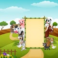 Happy farm animals with blank sign bamboo Royalty Free Stock Photo