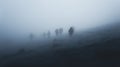 Hikers at distance during a strong blizzard