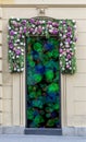 Entrance door with hippie flower decorations