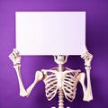 Halloween Human Skeleton Holding Blank Sign Purple Background Royalty Free Stock Photo