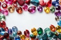 Illustration of image of various gemstones scattered around the border, with some in focus and others blurred to create dept