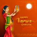 Indian woman performing Hindu married festival Karwa Cahuth looking moon through shieve