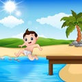 Jumping little boy in a water