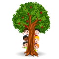 Kids playing in an apple tree Royalty Free Stock Photo