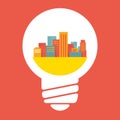 Illustration: a large city in lightbulb