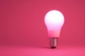 Led light bulb on pink background, minimal concept studio photography Royalty Free Stock Photo