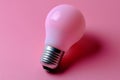 Led light bulb on pink background, minimal concept studio photography Royalty Free Stock Photo