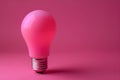 Led light bulb on pink background, minimal concept studio photography Royalty Free Stock Photo