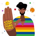 The LGBTQ man, African American male hold a hand with lettering STOP HOMOPHOBIA. He celebration pride day, month, LGBT