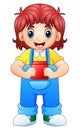 Little girl standing and holding toy cube