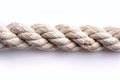 A long white rope with two ends, one end broken off, isolated on a solid background. the cut end of the cable is visible, sho Royalty Free Stock Photo