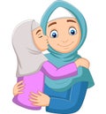 Muslim girl kissing her mother`s cheek