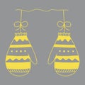 Illustration of a pair of yellow knitted mittens isolated on a gray background looks like a christmas balls for decoration