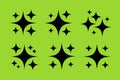 Pattern of Black FourPointed Star Shapes on a Plain Light Green Background Royalty Free Stock Photo