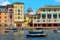 Illustration photography ,Colorful Italian Portofino with fishing boats in blue bay.