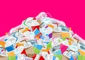 Pile garbage waste plastic and paper in mountain shape isolated pink background, bottles plastic garbage waste