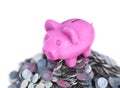 Pink piggy bank, ceramic shiny, on pile of 50 cents USA coins, isolated on white, 3d render Royalty Free Stock Photo