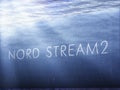 Illustration with a pipe and the inscription `Nord Stream 2` on it Royalty Free Stock Photo