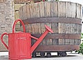 Illustration plugin used on picture of a watering can and old whiskey barrel