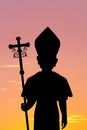 Illustration of Pope silhouette at sunset