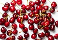 Illustration of red cherries pattern on white background.