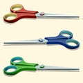 Illustration of red scissors, blue scissors and green scissors.