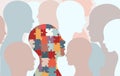 Autism syndrome concept. Jigsaw that forms human head in profile With other people`s background. Learning support and education. Royalty Free Stock Photo