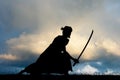 Samurai with sword at sunset Royalty Free Stock Photo