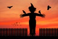 Scarecrow silhouette at sunset