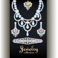 set of elegant necklace, earrings and bracelet with precious stones and the inscription jewelry collection