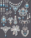 set of jewelry made of silver and precious stones brooch, earrings, necklace, pendants