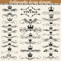 set of vintage calligraphic design elements with crowns Royalty Free Stock Photo