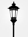 Illustration of a Shining Lamp Post in the Dark. Royalty Free Stock Photo