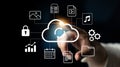 Hand Touching Cloud Icon With Various Digital Symbols Representing Technology, Data Storage, Security, and Multimedia Royalty Free Stock Photo