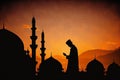 Illustration of Silhouette of a devout Islamic man pray to the Allah on hill, outside mosque, at sunset