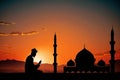 Illustration of Silhouette of a devout Islamic man pray to the Allah on hill, outside mosque, at sunset