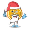 An Illustration of Slice OrangeFruit mascot character in Santa costume