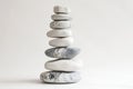 Stack of white pebble stones on white background,  Zen concept Royalty Free Stock Photo